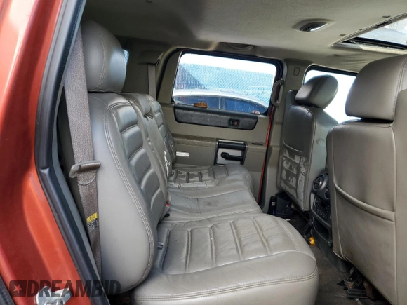 2003 Hummer H2 with VIN 5GRGN23U73H141713, listed as a Copart auction lot 84285624 with 152,719 mi miles and Non Repairable. Bid and sale history available at carsss.com. Image 11.