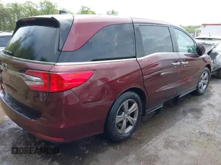 2018 Honda Odyssey EX with VIN 5FNRL6H56JB015557, listed as a IAAI auction lot 42112667 with Not provided miles and . Bid and sale history available at DreamBid. Image 4.