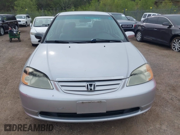 2003 Honda Civic LX with VIN 2HGES16533H571332, listed as a IAAI auction lot 42153221 with 202,926 mi miles. Bid and sale history available at carsss.com. Image 6.