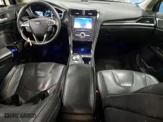 2020 Ford Fusion Hybrid Titanium with VIN 3FA6P0RU3LR233957, listed as a Copart auction lot 84908134 with 71,666 mi miles and Salvage Title. Bid and sale history available at carsss.com. Image 8.