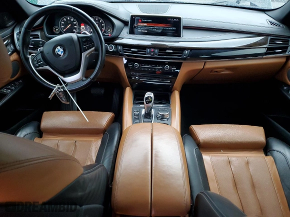 2017 BMW X6 sDrive35i with VIN 5UXKU0C36H0G69163, listed as a Copart auction lot 87044784 with 99,452 mi miles and Salvage Title. Bid and sale history available at carsss.com. Image 8.