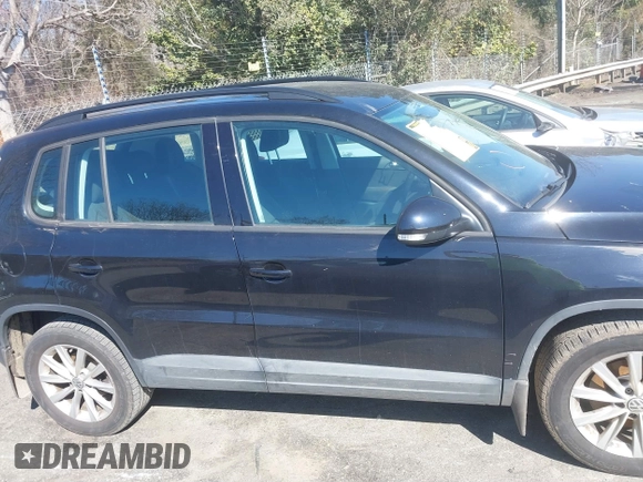 2017 Volkswagen Tiguan S with VIN WVGBV7AX3HK053429, listed as a IAAI auction lot 41610376 with 85,807 mi miles and . Bid and sale history available at DreamBid. Image 13.