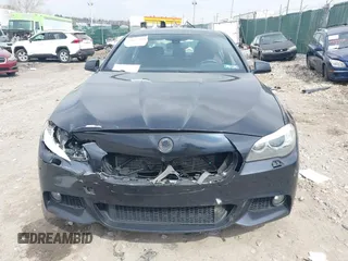 2013 BMW 5 Series 535i xDrive with VIN WBAFU7C51DDU75974, listed as a IAAI auction lot 41837789 with 216,394 mi miles and . Bid and sale history available at carsss.com. Image 11.