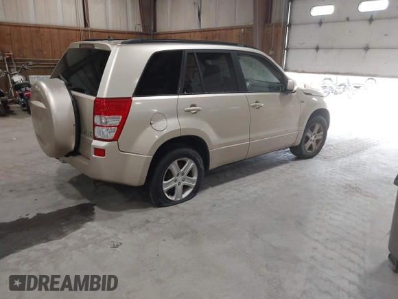 2006 Suzuki Grand Vitara Luxury with VIN JS3TD947464102420, listed as a IAAI auction lot 42453730 with 135,370 mi miles and . Bid and sale history available at DreamBid. Image 4.