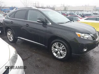 2012 Lexus RX 450h with VIN JTJBC1BA3C2435970, listed as a IAAI auction lot 41877284 with 319,977 mi miles and . Bid and sale history available at DreamBid. Image 1.