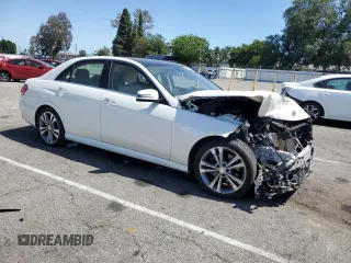2016 Mercedes-Benz E 350 Sport with VIN WDDHF5KB1GB211600, listed as a Copart auction lot 56055925 with 62,527 mi miles and Salvage Title. Bid and sale history available at DreamBid. Image 4.