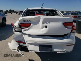 2023 Kia Rio S with VIN 3KPA24AD2PE579419, listed as a Copart auction lot 73399664 with 47,857 mi miles and Salvage Title. Bid and sale history available at DreamBid. Image 6.