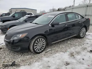 2015 Lincoln MKS with VIN 1LNHL9EK3FG606977, listed as a Copart auction lot 44195545 with 101,577 mi miles and Clean Title. Bid and sale history available at carsss.com. Image 1.