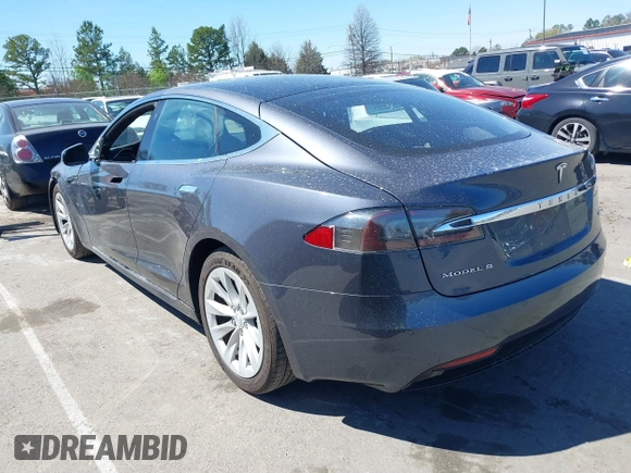 2017 Tesla Model S 100D with VIN 5YJSA1E20HF198503, listed as a IAAI auction lot 41843782 with 77,281 mi miles and . Bid and sale history available at DreamBid. Image 3.