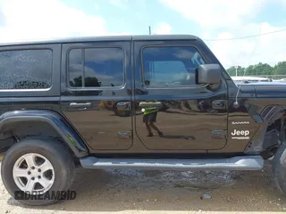 2019 Jeep Wrangler Unlimited Sahara with VIN 1C4HJXEN9KW514880, listed as a IAAI auction lot 42319437 with 70,186 mi miles and . Bid and sale history available at DreamBid. Image 14.