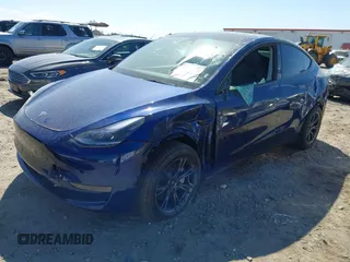 2024 Tesla Model Y Long Range with VIN 7SAYGDEE5RA329172, listed as a IAAI auction lot 41892147 with 8,030 mi miles and . Bid and sale history available at DreamBid. Image 22.