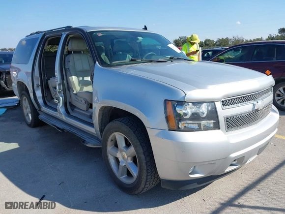2012 Chevrolet Suburban LT with VIN 1GNSCJE01CR220186, listed as a IAAI auction lot 41476520 with 117,714 mi miles. Bid and sale history available at carsss.com. Image 1.
