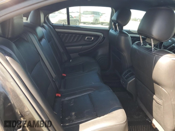 2015 Ford Taurus SEL with VIN 1FAHP2E8XFG209390, listed as a Copart auction lot 58992305 with 99,498 mi miles and Salvage title. Bid and sale history available at DreamBid. Image 10.