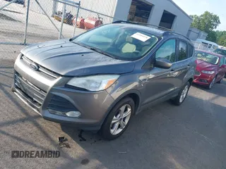2013 Ford Escape SE with VIN 1FMCU0GX3DUC51805, listed as a IAAI auction lot 42481078 with 162,805 mi miles and . Bid and sale history available at DreamBid. Image 2.