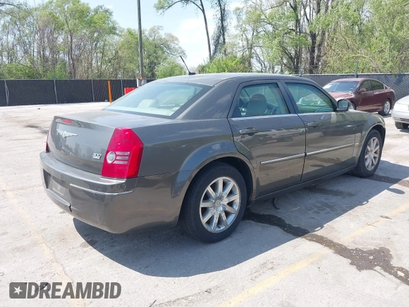 2008 Chrysler 300 Touring with VIN 2C3LA53G48H295678, listed as a IAAI auction lot 42007155 with 218,020 mi miles. Bid and sale history available at carsss.com. Image 4.