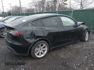 2023 Tesla Model Y Long Range with VIN 7SAYGDEEXPA121625, listed as a IAAI auction lot 41959524 with Not Provided miles and . Bid and sale history available at carsss.com. Image 4.