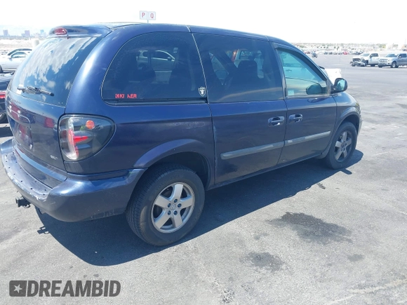 2005 Dodge Caravan SXT with VIN 1D8GP45R65B280660, listed as a IAAI auction lot 42169027 with 246,407 mi miles and . Bid and sale history available at carsss.com. Image 4.