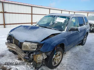 2007 Subaru Forester X with VIN JF1SG63697G718015, listed as a IAAI auction lot 41560187 with 209,572 mi miles. Bid and sale history available at carsss.com. Image 2.