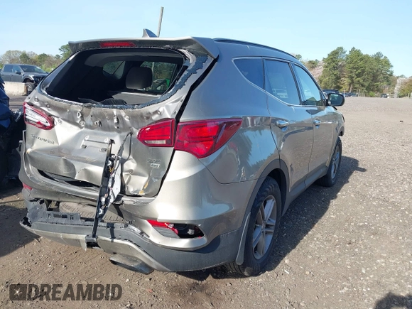 2018 Hyundai Santa Fe 2.4L z VIN 5NMZUDLB7JH077241, wystawiony jako IAAI lot #42135854 z przebiegiem 59 819 mil mil oraz . Historia ofert i sprzedaży dostępna na DreamBid. Obrazek 4.