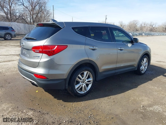 2013 Hyundai Santa Fe 2.0T Sport with VIN 5XYZWDLA1DG003779, listed as a IAAI auction lot 41761431 with 127,895 mi miles. Bid and sale history available at carsss.com. Image 4.