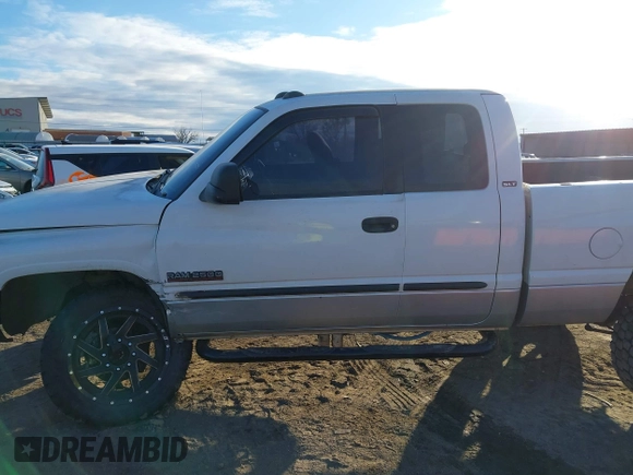 2002 Dodge 2500 with VIN 3B7KF23672M273990, listed as a IAAI auction lot 41354174 with 198,542 mi miles and . Bid and sale history available at DreamBid. Image 14.