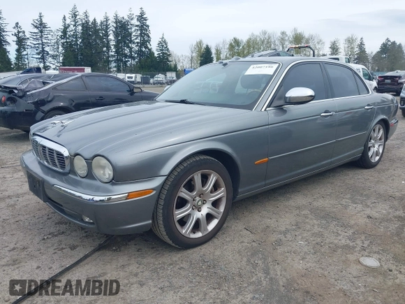 2004 Jaguar XJ with VIN SAJEA74C94SG10199, listed as a IAAI auction lot 42007186 with 138,807 mi miles and . Bid and sale history available at DreamBid. Image 2.