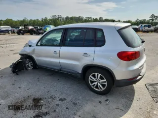 2012 Volkswagen Tiguan S с VIN WVGAV7AXXCW606008, выставлен на аукционе Copart как лот 62232655 с пробегом 184 316 миль миль и Списание • Salvage title. История ставок и продаж доступна на DreamBid. Изображение 2.