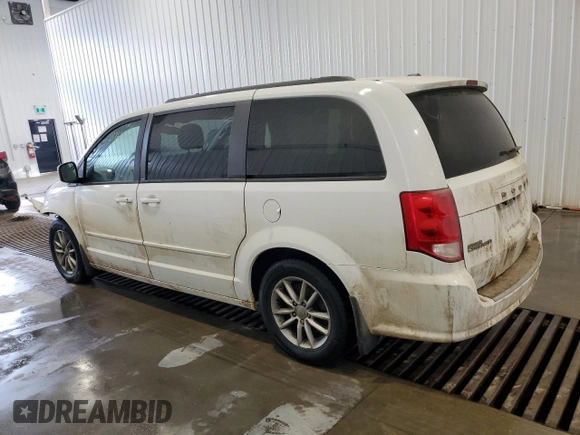 2014 Dodge Grand Caravan R/T with VIN 2C4RDGEG7ER183064, listed as a Copart auction lot 87761485 with 181,618 mi miles and Salvage Title. Bid and sale history available at DreamBid. Image 2.
