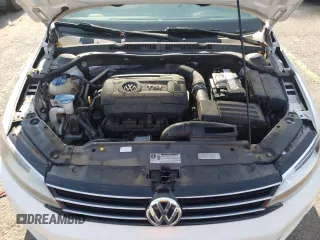 2015 Volkswagen Jetta SE z VIN 3VWD07AJ8FM224623, wystawiony jako Copart lot #62408765 z przebiegiem 142 827 mil mil oraz Czysty tytuł • Clean title. Historia ofert i sprzedaży dostępna na DreamBid. Obrazek 11.