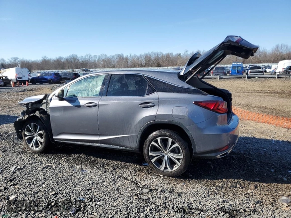2021 Lexus RX with VIN 2T2HZMDA5MC293551, listed as a Copart auction lot 47297435 with 114,007 mi miles and Salvage Title. Bid and sale history available at carsss.com. Image 2.
