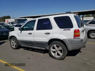 2004 Ford Escape XLS with VIN 1FMYU02184DA20455, listed as a Copart auction lot 73806544 with 322,565 mi miles and Clean Title. Bid and sale history available at DreamBid. Image 2.