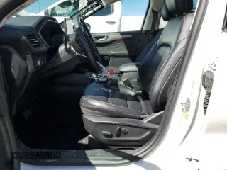 2021 Ford Escape Titanium Hybrid z VIN 1FMCU0DZ5MUB04522, wystawiony jako Copart lot #49127385 z przebiegiem 66 996 mil mil oraz Szkody całkowita. Historia ofert i sprzedaży dostępna na DreamBid. Obrazek 7.