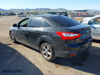 2013 Ford Focus SE with VIN 1FADP3F2XDL337583, listed as a IAAI auction lot 41842030 with 163,947 mi miles. Bid and sale history available at carsss.com. Image 3.