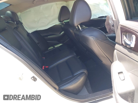 2017 Nissan Maxima S with VIN 1N4AA6AP6HC441664, listed as a IAAI auction lot 39630300 with 80,963 mi miles and . Bid and sale history available at DreamBid. Image 8.