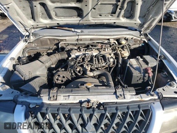 2003 Mitsubishi Montero ES z VIN JA4LS21H13J005577, wystawiony jako Copart lot #41415375 z przebiegiem 171 037 mil mil oraz Szkoda całkowita • Salvage title. Historia ofert i sprzedaży dostępna na DreamBid. Obrazek 12.