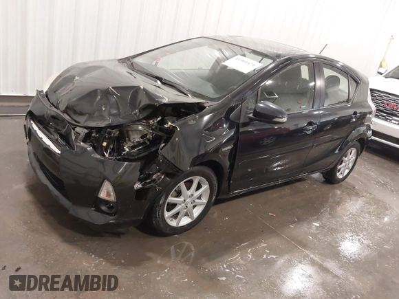 2012 Toyota Prius c One with VIN JTDKDTB35C1009930, listed as a IAAI auction lot 41961471 with 174,252 mi miles. Bid and sale history available at carsss.com. Image 2.