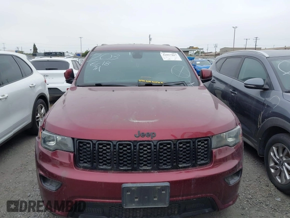 2018 Jeep Grand Cherokee Altitude with VIN 1C4RJEAG0JC433654, listed as a IAAI auction lot 42057867 with 103,552 mi miles and . Bid and sale history available at DreamBid. Image 12.