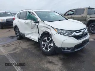 2018 Honda CR-V Touring with VIN 2HKRW2H96JH689695, listed as a IAAI auction lot 41562625 with 56,301 mi miles. Bid and sale history available at carsss.com. Image 1.