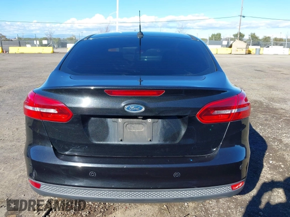 2015 Ford Focus SE with VIN 1FADP3F21FL262033, listed as a IAAI auction lot 41521714 with 101,890 mi miles. Bid and sale history available at carsss.com. Image 16.