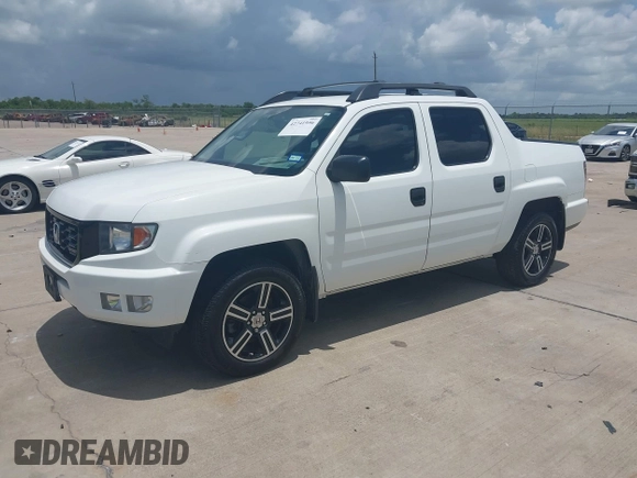 2014 Honda Ridgeline Sport with VIN 5FPYK1F71EB011340, listed as a IAAI auction lot 42741956 with 156,149 mi miles and . Bid and sale history available at DreamBid. Image 17.