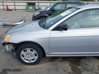 2001 Honda Civic LX with VIN 1HGEM22511L104898, listed as a IAAI auction lot 41855518 with 255,538 mi miles. Bid and sale history available at carsss.com. Image 22.