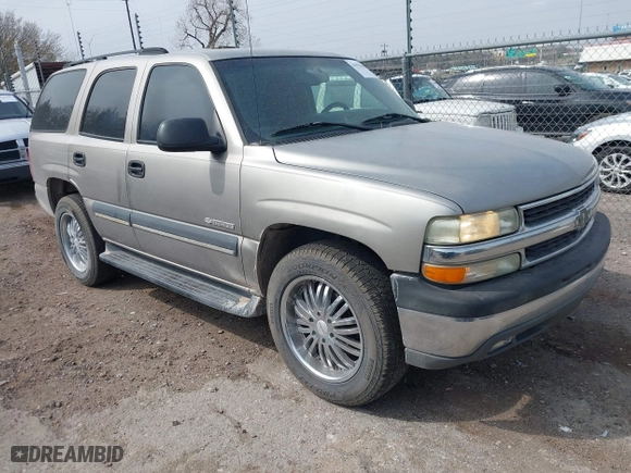 2003 Chevrolet Tahoe LS with VIN 1GNEC13V03R272663, listed as a IAAI auction lot 41933407 with 245,113 mi miles. Bid and sale history available at carsss.com. Image 1.