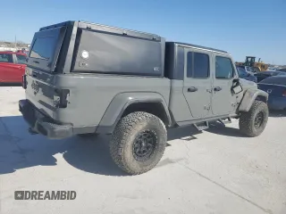 2022 Jeep Gladiator Texas Trail with VIN 1C6HJTAG8NL103449, listed as a Copart auction lot 49823595 with 60,902 mi miles and Salvage Title. Bid and sale history available at carsss.com. Image 3.
