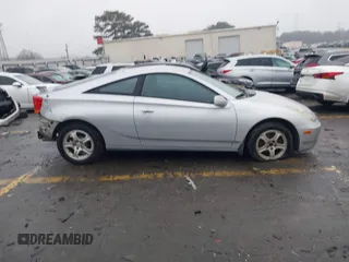 2002 Toyota Celica GT z VIN JTDDR32T420128325, wystawiony jako IAAI lot #41415924 z przebiegiem 256 994 mil mil oraz . Historia ofert i sprzedaży dostępna na DreamBid. Obrazek 13.