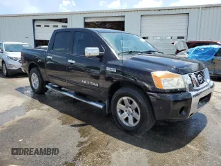 2012 Nissan Titan SV with VIN 1N6BA0ED1CN323589, listed as a Copart auction lot 62068904 with 148,354 mi miles and Salvage Title. Bid and sale history available at DreamBid. Image 4.