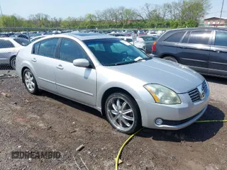 2004 Nissan Maxima SL with VIN 1N4BA41E84C822059, listed as a IAAI auction lot 42032195 with 213,650 mi miles. Bid and sale history available at carsss.com. Image 1.