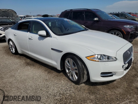 2014 Jaguar XJ Portfolio with VIN SAJWJ2GD6E8V74284, listed as a Copart auction lot 74577584 with 39,835 mi miles and Non repairable. Bid and sale history available at DreamBid. Image 4.