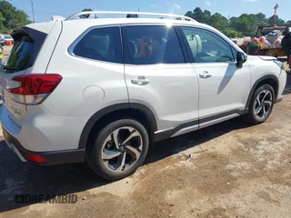 2023 Subaru Forester Touring with VIN JF2SKARC3PH525847, listed as a IAAI auction lot 42315726 with 32,235 mi miles and . Bid and sale history available at DreamBid. Image 4.