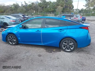 2022 Toyota Prius L Eco with VIN JTDKAMFU5N3165006, listed as a IAAI auction lot 41753470 with 33,567 mi miles. Bid and sale history available at carsss.com. Image 14.