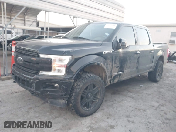 2019 Ford F-150 XL with VIN 1FTEW1E45KKC47947, listed as a IAAI auction lot 41078136 with 121,489 mi miles. Bid and sale history available at carsss.com. Image 2.